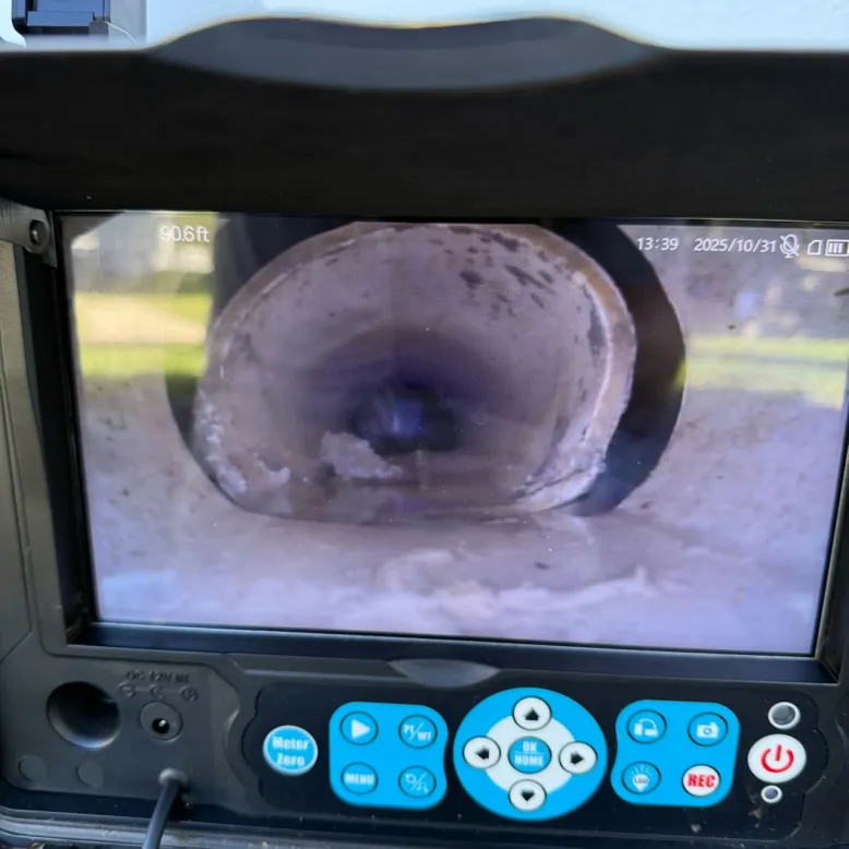 Sewer scope monitor showing interior line condition at about 90 feet
