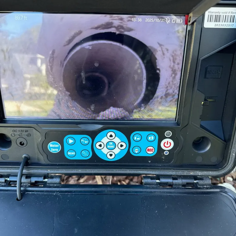 Sewer scope camera view showing interior of underground line